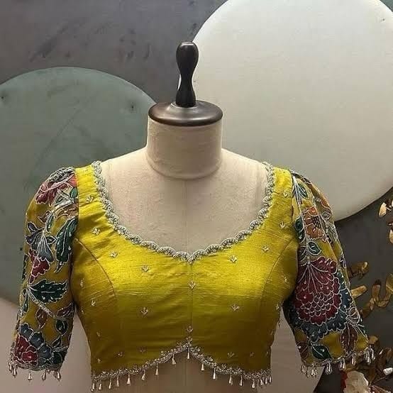 Stylish Mustard Yellow Silk Designer Blouse with Printed Puff Sleeves & Tassel Back