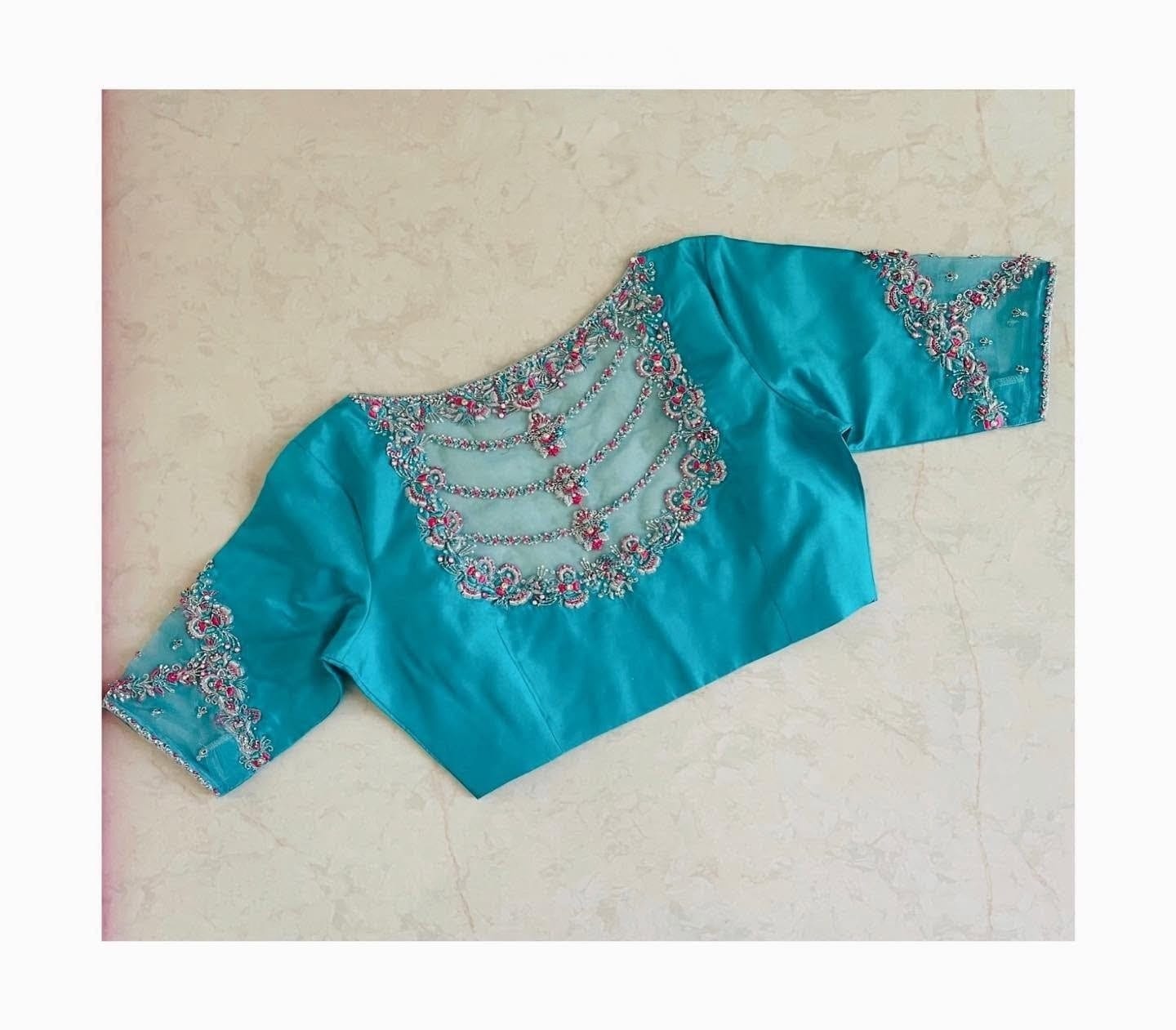 Turquoise Blue Designer Silk Blouse with Floral Hand Embroidery & Net Neck Design